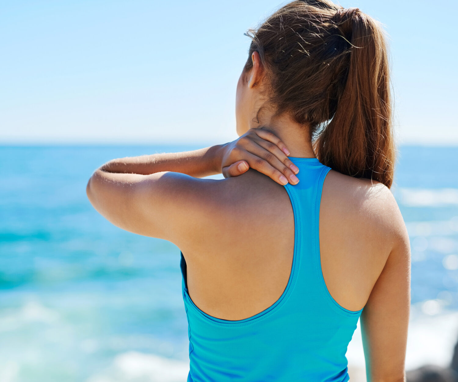 Shot of a sporty young woman exercising outside